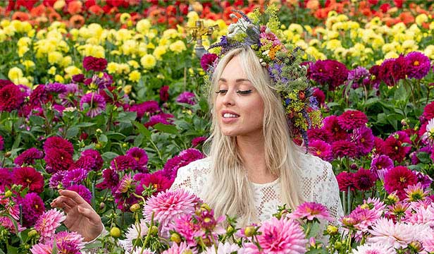 Lady with florals at RHS Hampton Court Palace Show