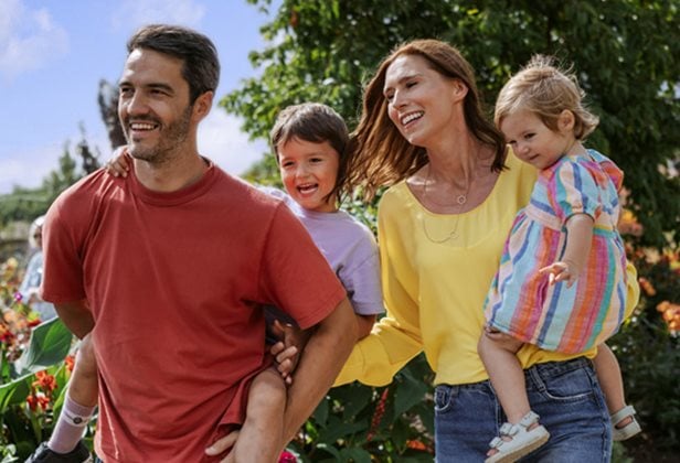 Photo of a family on a summer day walking through RHS Hude Hall